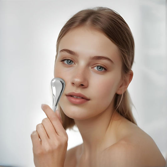 Autera RelaxRoller being used on the face by a young woman for relaxation and massage.