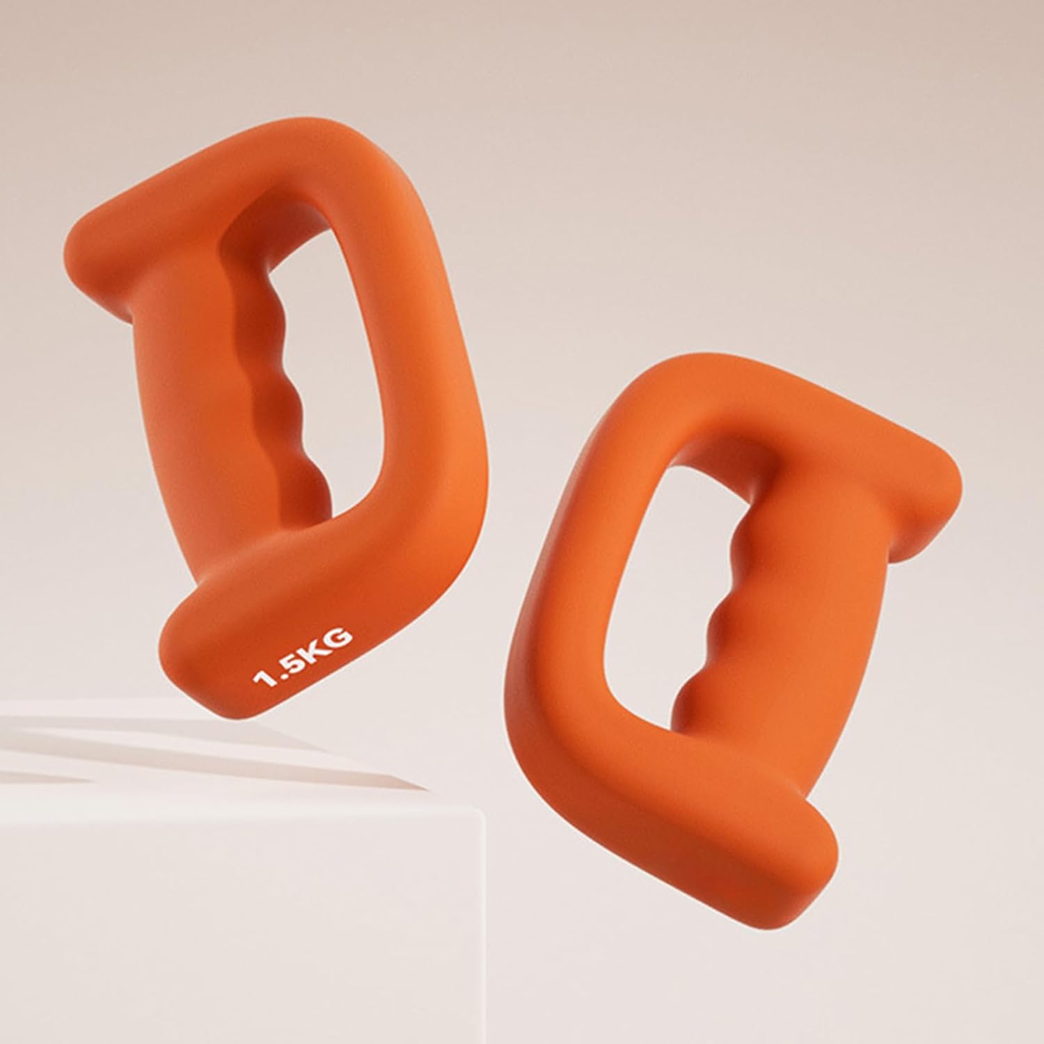 Autera DuoWeights haltères hexagonaux professionnels en orange, parfaits pour l'entraînement à domicile.