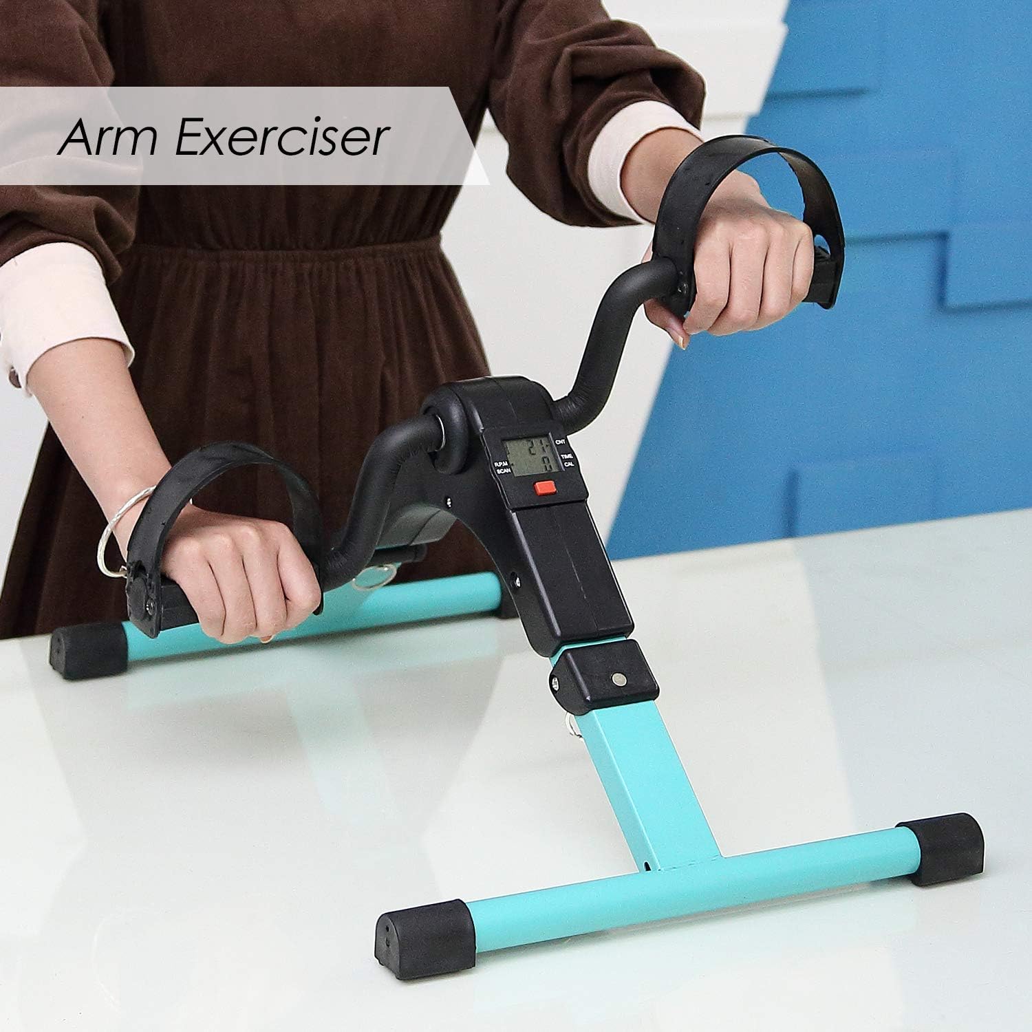 Autera MotionMini™ arm exerciser with adjustable resistance and digital display for tracking progress.