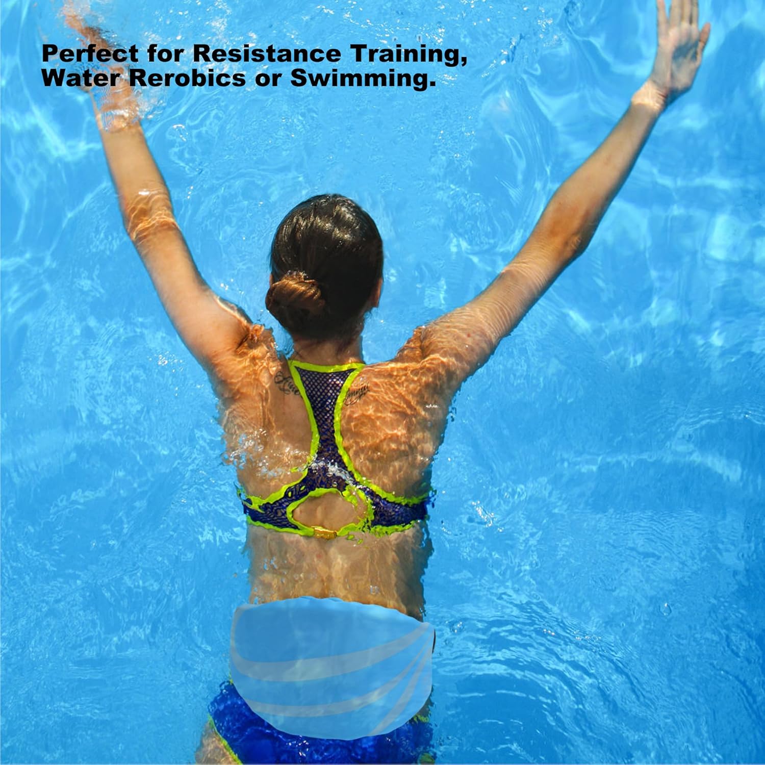 Woman exercising in pool using Autera AquaTone™ for resistance training and water aerobics.
