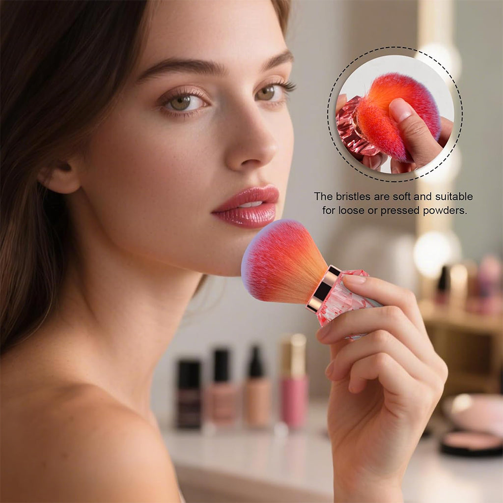 Autera DiamondBlend makeup brush held by a model, showcasing soft bristles for flawless application.